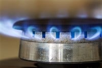 Natural gas blue flames burns on the kitchen stove, best natural gas stocks